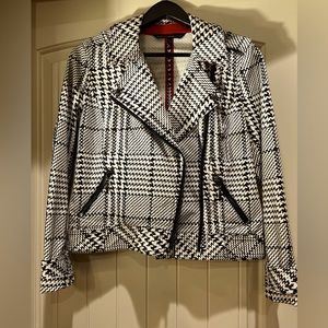 Black and white jacket. White House Black Market brand, size 6. Good condition.